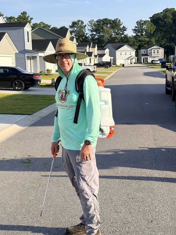Jon with the backpack sprayer